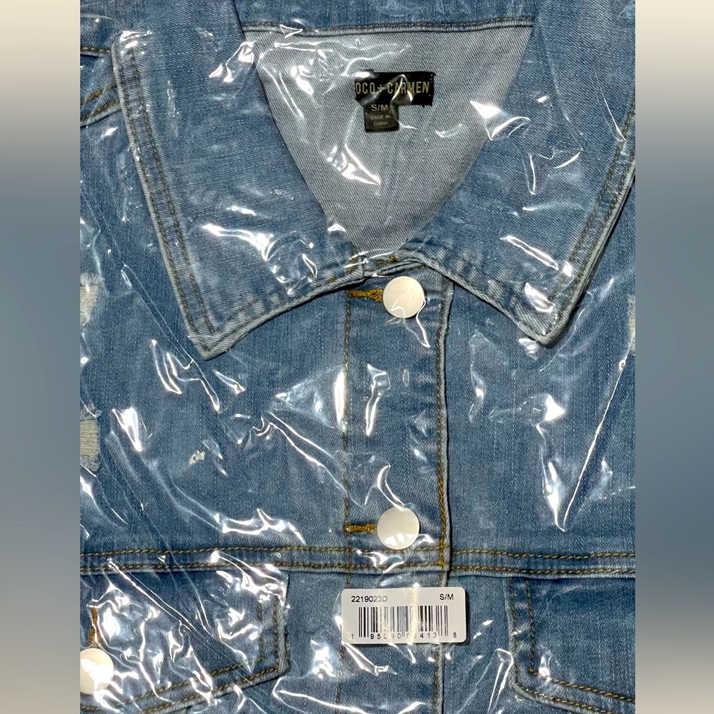 Brand new Jean ripped Jacket